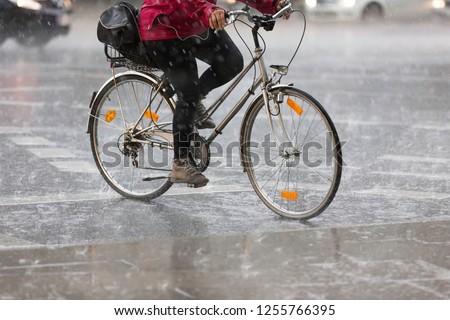 female cyclist in the rain
