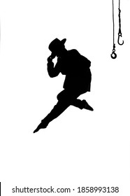 A female dancer dances on stage. Dressed in men's 
clothing and wearing a man's hat, she is seen leaping 
in mid-air as a silhouette.