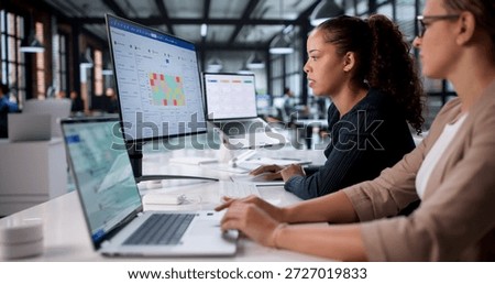 Female Data Analyst Analyzing Heatmap On Laptop In Office Setting.