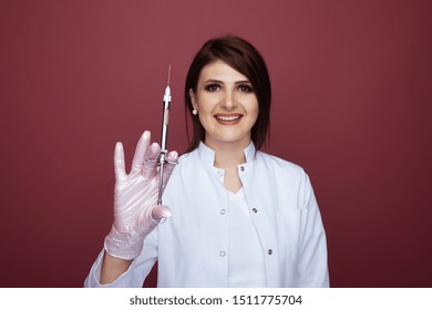 Female Dentist Holding Syringe Smiling Isolated Stock Photo 1511775704 ...