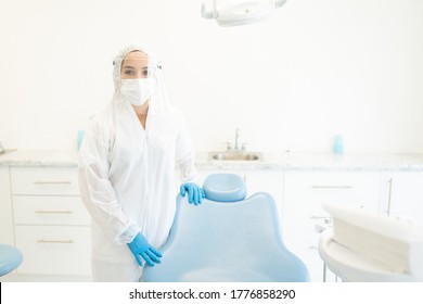 Female Dentist Wearing Face Shield And Mask During Coronavirus Outbreak