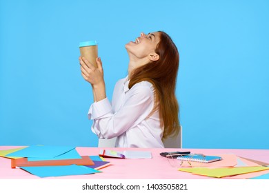 Female Designer Takes Revenge At Her Desk Coffee Paper Emotions Blue Background Morning