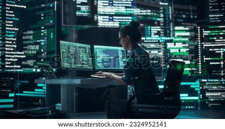 Female Developer Thinking and Typing on Computer, Surrounded by Big Screens Showing Coding Language. Professional Programmer Creating Software, Running Coding Tests. Futuristic Concept of Programming