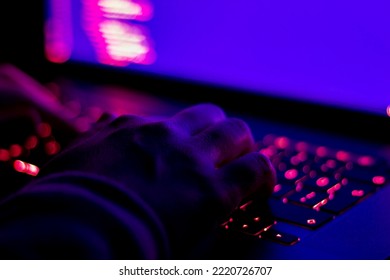 Female developer working in the dark. Focused on hands. - Powered by Shutterstock