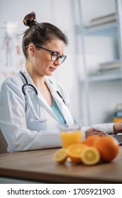 Female Dietitian Working In The Office