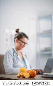 Female Dietitian Working In The Office