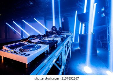 Female Djs test the sound system before playing. - Powered by Shutterstock