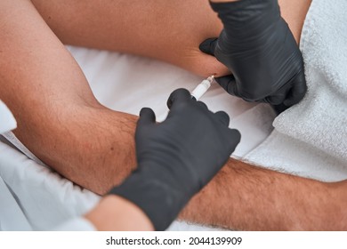 Female Doctor Carrying Out A Body Sculpting Procedure