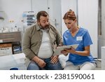 Female doctor consulting with overweight patient, discussing test result in doctor office. Obesity affecting middle-aged men