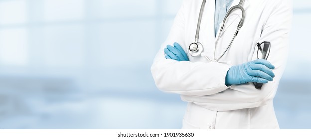 Female Doctor With Crossed Hands Over Grey Background. Impersonal No Face. Medical Banner. Copy Space. Book Appointment Or Checkup Time Reminder. Doctors Advice