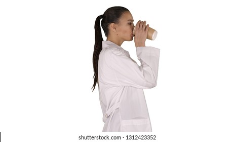 Female Doctor Drinking Coffee And Walking On White Background.