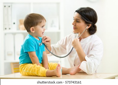 Female Doctor Examining Kid Little Child Boy