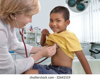 Female Doctor Examining Little Child Boy