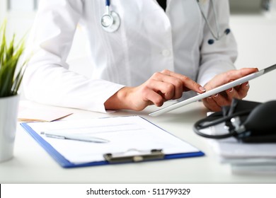 Female Doctor Hold Digital Tablet Pc And Point In Touch Screen With Finger Closeup. Human Interaction, Professional Consultation, Therapeutist Examine Test Results, New Search Opportunities Concept