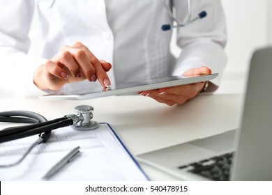 Female Doctor Hold Digital Tablet Pc And Point In Touch Screen With Finger Closeup. Human Interaction, Professional Consultation, Therapeutist Examine Test Results, New Search Opportunities Concept