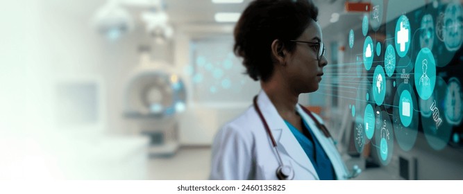 Female doctor looking halographic screen computer to display and analyse processing patient data on futuristic virtual interface screen hospital background concept. - Powered by Shutterstock