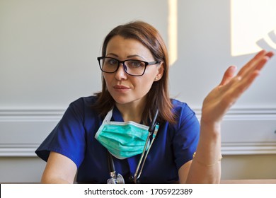 Female Doctor Looking At Webcam, Closeup Face. Video Conference, Specialist Talking, Counseling, Helping Patient Online. Technology, People Concept