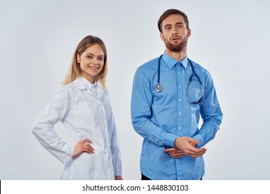 A female doctor and a male assistant colleague at work medicine medicine