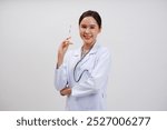 Female doctor in medical gown holding syringe on white background.