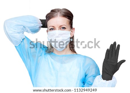 Female doctor in medical mask and black gloves looking at camera. isolated on white. Healthy, vitamins, vaccination, medical store, pharmacy, recovery, proper nutrition concept