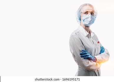 Female Doctor In Medical Mask On The Face And Gloves On A White Background