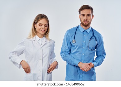 A female doctor is next to an assistant to a work colleague medicine professionals