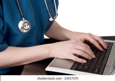 Female Doctor Or Nurse Typing On Laptop Keyboard