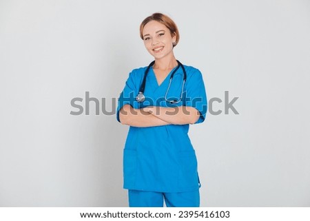 Female doctor with phonendoscope stethoscope on white background