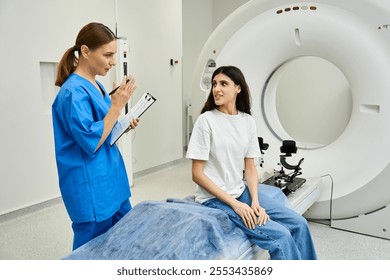 Female doctor provides guidance to patient before MRI scan in hospital setting focused on health. - Powered by Shutterstock