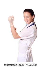 Female Doctor Putting On Surgical Gloves.