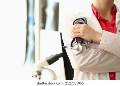 Female Doctor Stand Holding Stethoscope Equipment In Hand, Schedule Medical Appointment