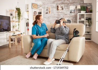 Female Doctor With Stethoscope And Old Woman Using Vr Headset.