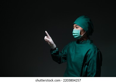 Female Doctor Surgeon Finger Interaction Mockup Gesture Wearing Scrub Overall Suit For Medical Surgery Clothing, Operation Uniform Ready To Operate On Ill Patient In Operating Room, Healthcare Medical