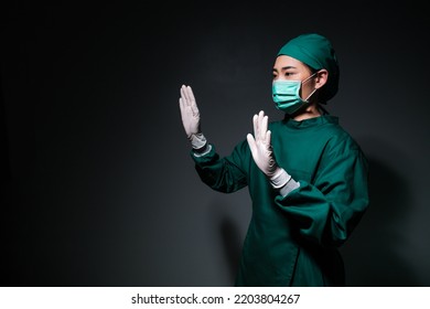 Female Doctor Surgeon Hand Interaction Mockup Gesture Wearing Scrub Overall Suit For Medical Surgery Clothing, Operation Uniform Ready To Operate On Ill Patient In Operating Room, Healthcare Medical