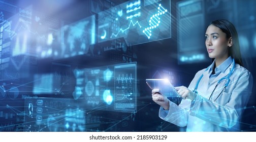 Female doctor tapping on tablet and examining patient data on virtual screen. Near future in medical science.