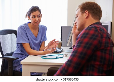 Female Doctor Treating Patient Suffering With Depression