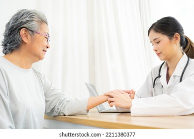 Female doctor using hand to checking the pulse. Doctor checking patient's pulse. medical check up. - Shutterstock ID 2211380377