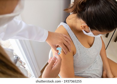 Female Doctor Vaccinating Years Old Woman At Ombo.