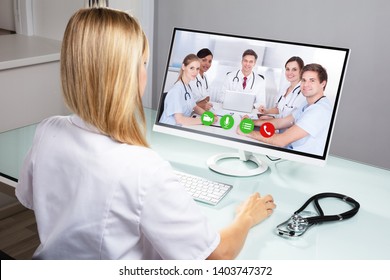 Female Doctor Video Conferencing Colleagues On Stock Photo (Edit Now ...