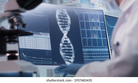 Female doctor working in laboratory. Studying DNA samples - Powered by Shutterstock