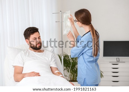 Similar – Female doctor comforting older patient