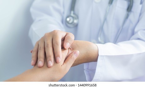 Female doctors comfort the patients at the consultation room - medical concept - Shutterstock ID 1440991658