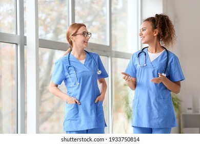 Female Doctors Discussing Diagnosis Clinic Stock Photo 1933750814 ...