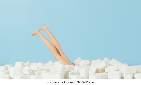 Female Doll Diving In Sugar Cubes. Stop Sugar Adiction Concept.