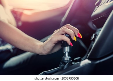 Female Driver Hand Shifting Gear Shift Knob Manually Before The Beginning Of The Ride