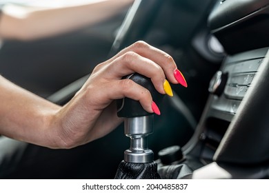 Female Driver Hand Shifting Gear Shift Knob Manually Before The Beginning Of The Ride