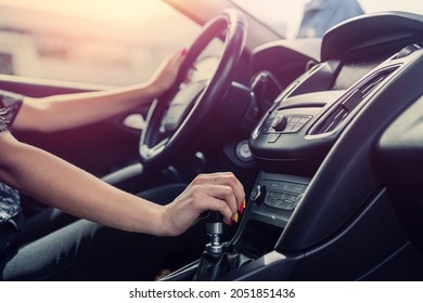 Female Driver Hand Shifting Gear Shift Knob Manually Before The Beginning Of The Ride