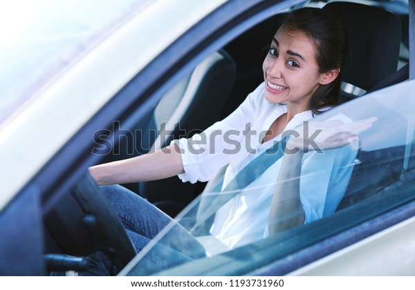 the female driver looking guilty and apologizes\
after accident