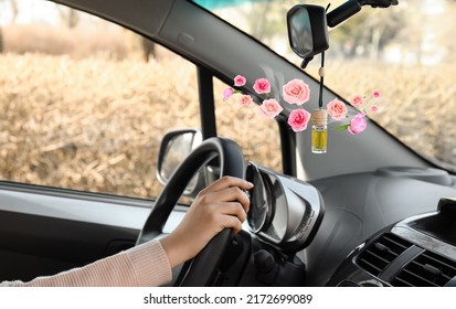 Female Driver Near Hanging Aroma Air Freshener In Car Salon