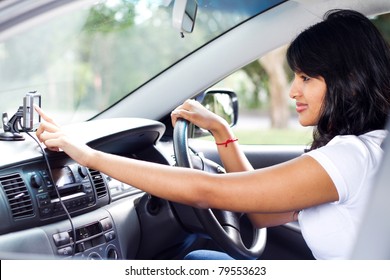 female driver using GPS navigator